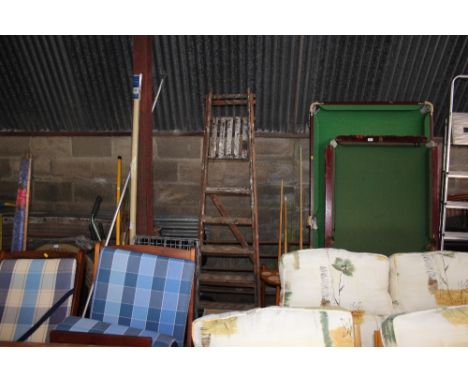 A wooden step ladder 