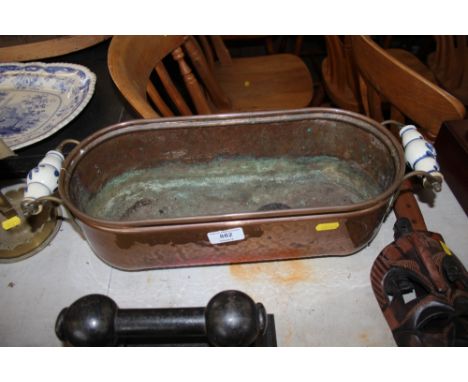 A copper planter