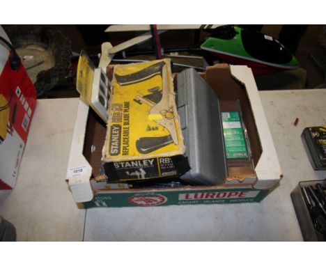 A box of various tools and fittings 