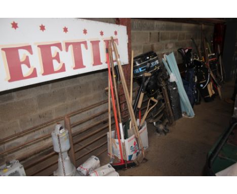 A quantity of long handled garden tools etc. 