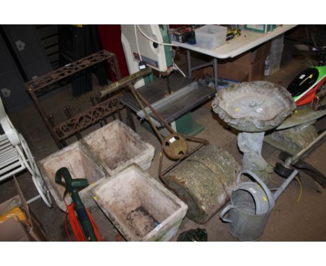 An iron crete garden roller 