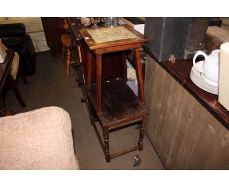 An oak occasional table together with a tile top occasional table