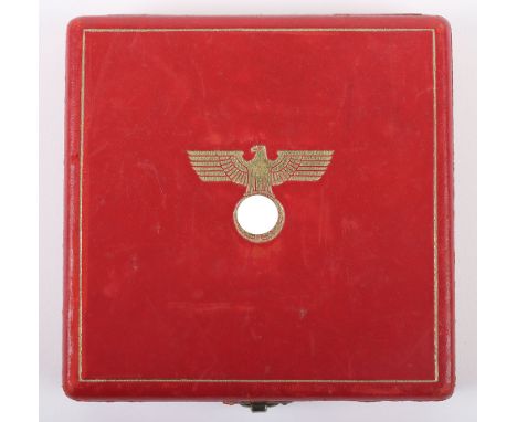 Case for a Third Reich Eagle Order Breast Badge, fine example of the red leatherette case with gilt NSDAP style eagle to the 