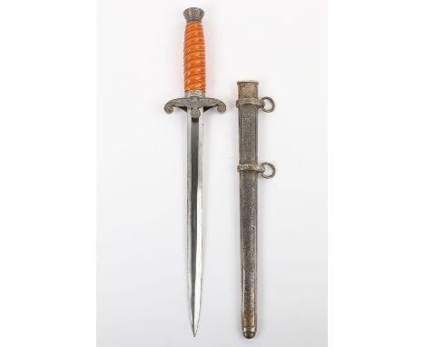 WW2 German Army Officers Dress Dagger by E & F Horster Solingen, with orange celluloid grip, pommel with oakleaves relief. Cr