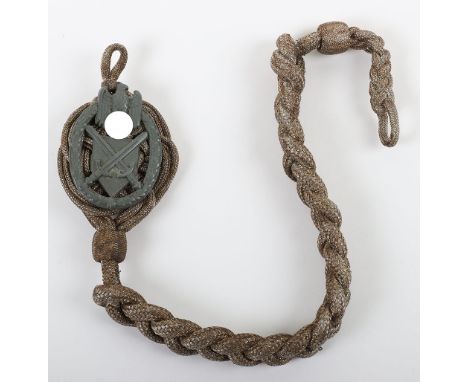 WW2 German Army Marksman Lanyard, with zinc metal shield to the central section. Twist knotted cord with loop at the top and 
