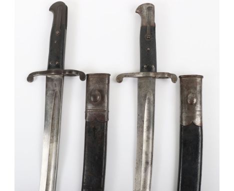 2x British 1856 Yataghan Bayonets, one with regimental markings of Volunteer Berkshire regiment. Both with the original leath