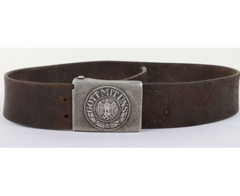 WW2 German Army Combat Belt and Buckle, having aluminium other ranks belt buckle with its leather tab. Housed on its leather 