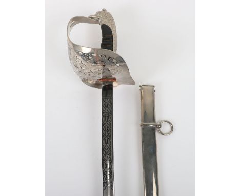 Iraqi Army Officers Sword by WKC Solingen, fine example with pierced large dish guard, faux fish skin grip with wire binding.