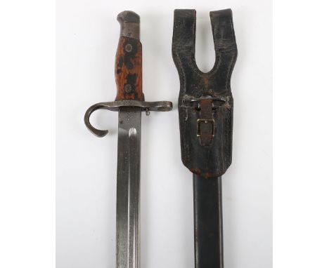 Rare Japanese Naval Landing Forces Type 35 Bayonet, with wooden grips and the special release catch to the side of the tang, 