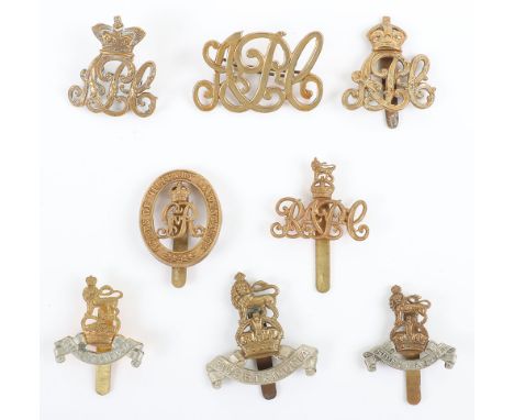Army Pay Corps Badge Grouping, consisting of Victorian pattern cap badge, post 1902 example, APC brass forage cap badge, 1920