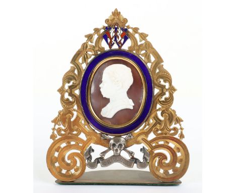 17th Lancers A Mounted Cameo, Head &amp; Shoulders of an Officer c1860-1880, shown in profile and set within a blue enamel ov