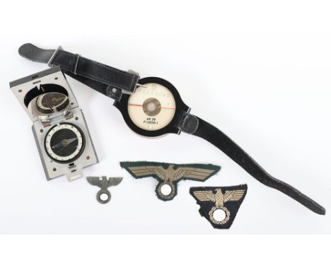 Luftwaffe Aviators Compass, liquid filled Luftwaffe aviators wrist compass with the leather wrist strap. Marked to the revers