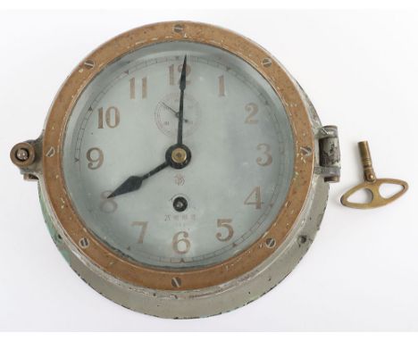 WW2 Japanese Naval Ships Bulkhead Clock, interesting example with the original brass mounted glazed cover. Body of the clock 