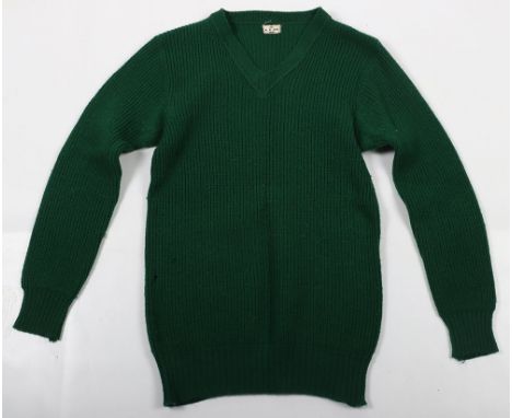 WW2 Women’s Land Army (W.L.A) Jumper, green woollen V neck jumper with original 1941 dated label to the collar. Remains in ge