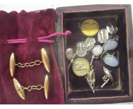 A group of gold, silver and other metal cuff links and a St Christopher pendant to include a pair of 9ct gold bullet shaped c