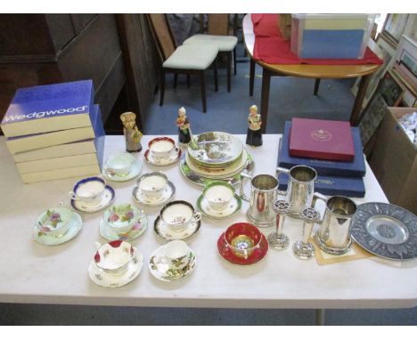 A collection of porcelain to include tea cups and saucers by Royal Albert, Paragon, and others, Wedgwood and Coalport plated 