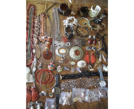 A quantity of vintage and modern costume jewellery to include a silver St Christopher pendant, a mother of pearl brooch with 