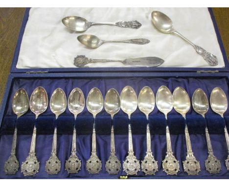A cased set of WWI silver teaspoons, twelve in total, together with three other silver teaspoons and a small silver plated bu