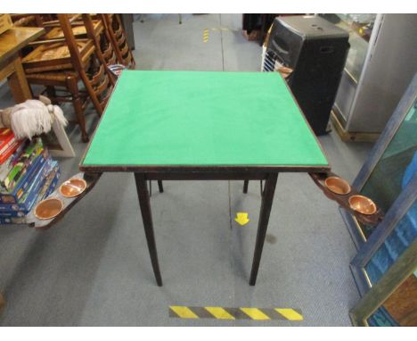 An early 20th century folding card table with four fold out token traysLocation: LWB 