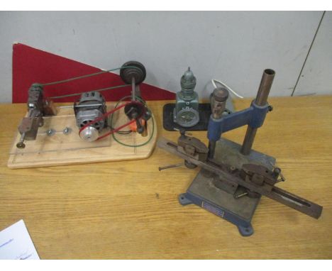 A homemade watchmakers lathe and a pillar press/drilling tool for clock platesLocation: G 