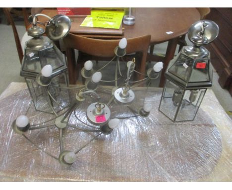 A pair of modern metal and  glass lantern style centre lights and a pair of metal chandeliersLocation: RCeiling 