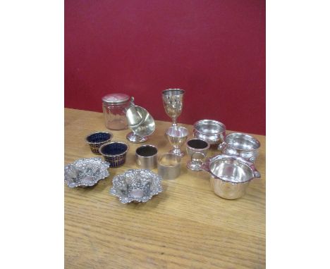 Silver to include two napkin rings (total weight of rings 75.4g), an egg cup 52.6g, two dishes 38.9g, and small silver plated