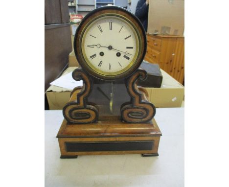 An early 20th century burr walnut and ebonized mantel clock 38cm h x 28cm w x 14cm d Location: LAF 