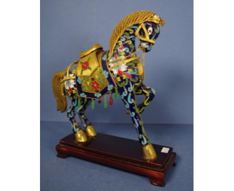 Chinese enamel cloisonne horse figure prancing horse with gilded saddlery. On wooden stand. H27cms approx.