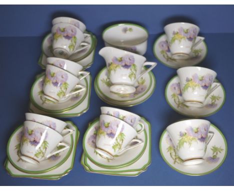 Eight Royal Doulton Glamis Thistle trios with 3 large teacup and saucers, a milk jug, sugar bowl plus extra saucer and plate