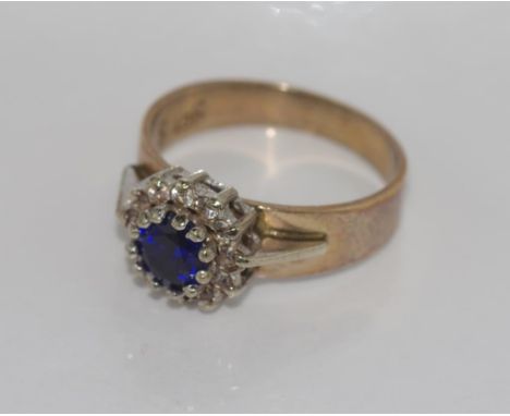 9ct yellow gold & synthetic sapphire ring size: L/6, total weight 3.6gms