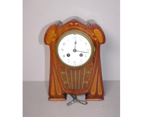 Art Nouveau French Japy Freres mantle clock with eight day striking movement, in marquetry and brass inlay case,together with