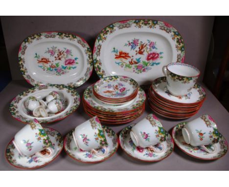 Minton part dinner service with flora and bird motif, No. 4844, comprising of 6 bread plates, 9 large saucers, 1 large breakf