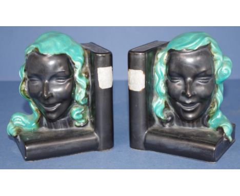 Pair Czechoslovakian ceramic bookends green and black ceramic women's head forms. H13cms approx (each).