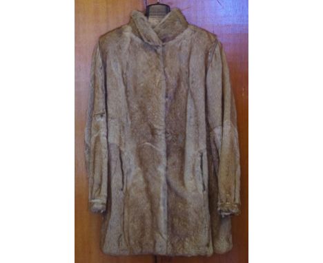 Vintage Canadian three quarter fur coat turned collar and toggle fastening with suede trimming.