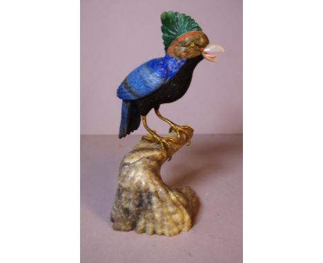 A semi precious stone bird on branch figurine made up of Lapis, Jade and agate, H20cm approx