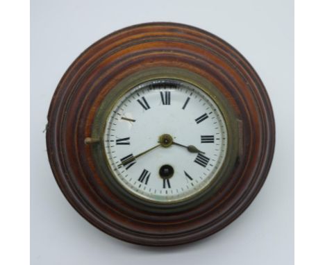 Antique ship clock with wooden mounted brass case and enamel dial, no key, 18.4cm diameter