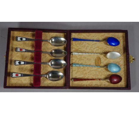 Two sets of enamel silver coffee spoons comprising of a cased set of card suit 4 hallmarked Birmingham 1939 (Elkington & Co) 