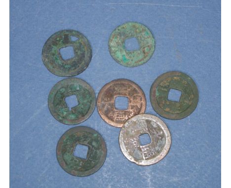 Seven vintage Chinese coins to include 5 Sun/Tang and 2 Ming