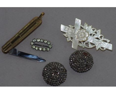 Pair Victorian cut steel button covers together with a MOP crucifix, gilt metal penknife and tiny buckle.