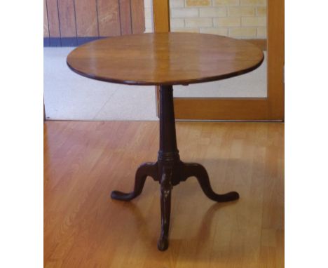 George III English oak tripod table with gun barrel pedestal, circa 1765, 82cm diameter, 73cm high approx