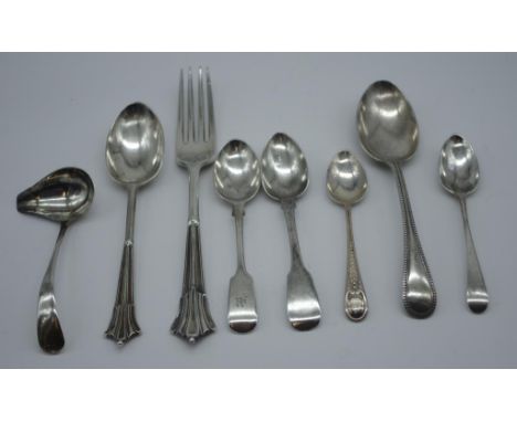 Eight sterling silver flat wares including a small ladle 12.5cm long hallmarked Sheffield (Viner's Ltd), 321 grams (total)