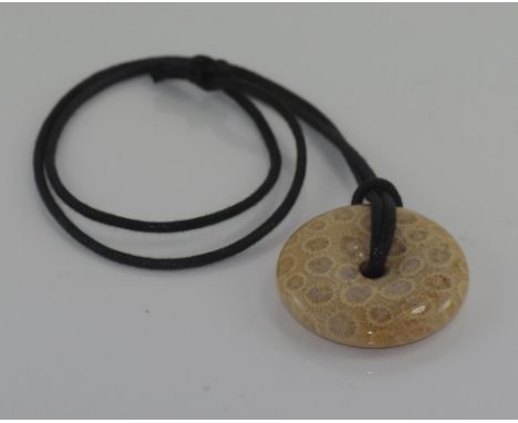 Fossil stone pendant on leather cord necklace