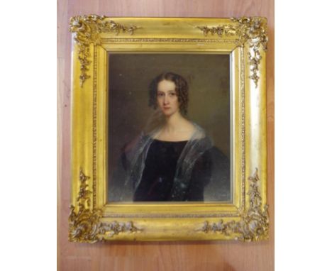 Early oil on panel portrait of lady Possibly 19th century. Unsigned. In early gilded frame. 29cmsX24cms approx.