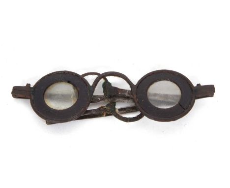 A pair of Georgian steel frame spectacles circa 1790 the inner rings made of horn, the folding steel arms terminating in circ