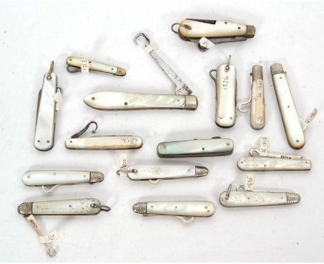 Group of eight mother of pearl cased and silver folding button hooks, five Victorian and three Edwardian examples, 5-7cm long