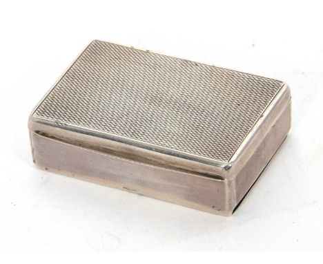 An Art Deco vester box of rectangular form, engine turned decorated lid with two vacant strike panels to the base, the inside