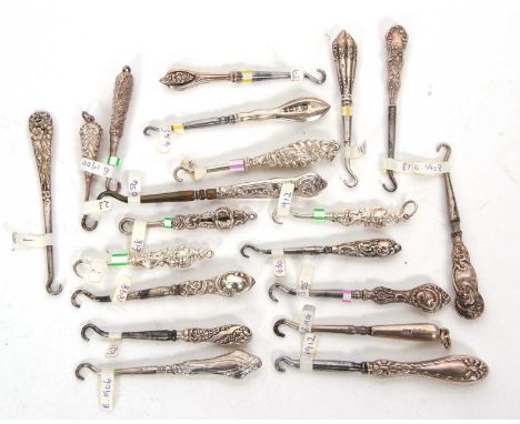 Group of thirteen late 19th/early 20th Century silver and steel small button hooks, various dates/makers together with six un