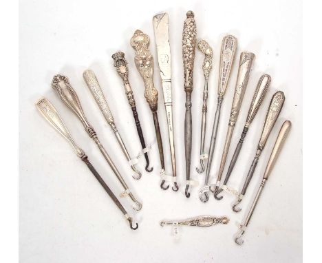 Group of nine button hooks stamped sterling, one with a makers mark for Tiffany &amp; Co, one  Bailey Banks &amp; Biddle, fou