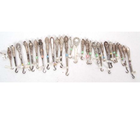 Group of twenty nine late 19th/early 20th Century silver and steel small button hooks, various dates and makers, 3-8.5cm long