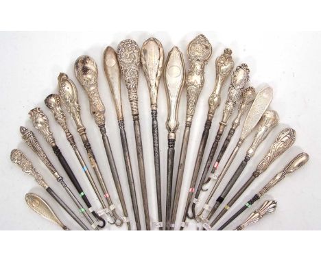 Group of twenty late 19th/early 20th Century silver and steel button hooks, various dates/makers, 11-28cm